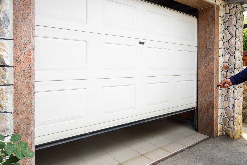 Rénovation porte de garage et portail à Marolles-les-Braults
